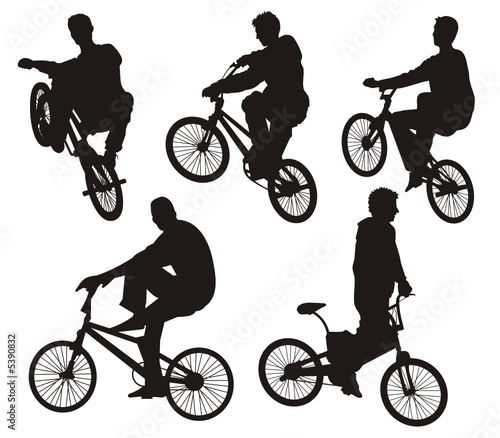 Five bicycle riders silhouettes