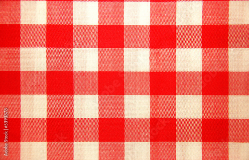 Deatil view of a red and white chequered traditional tablecloth