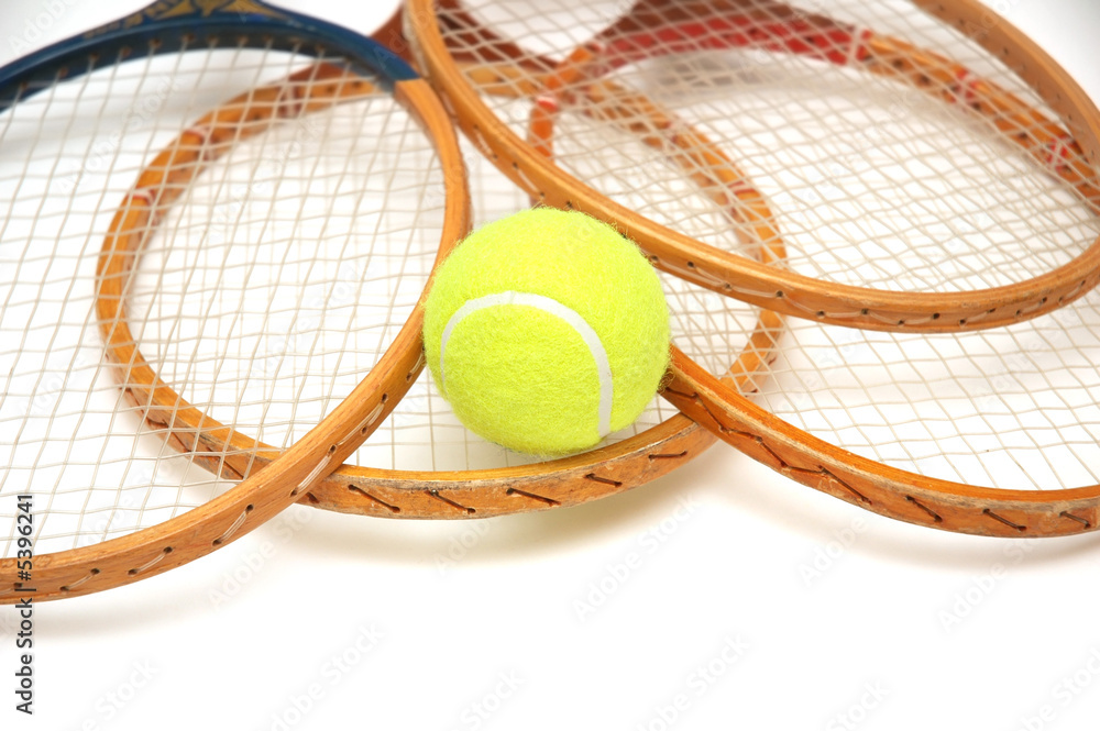 Tennis rackets and ball isolated on white