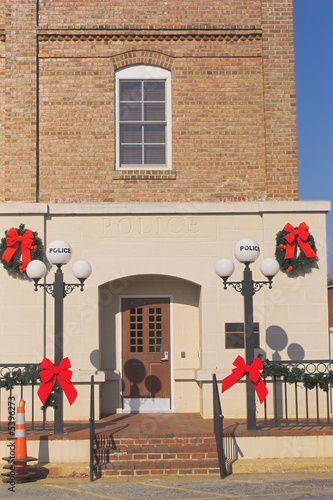 A police station decorated for Christmas.