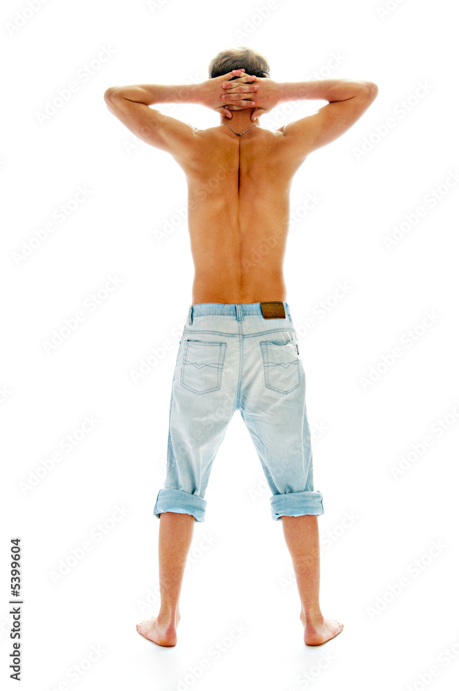 Fototapeta premium tanned man in jeans isolated on white background