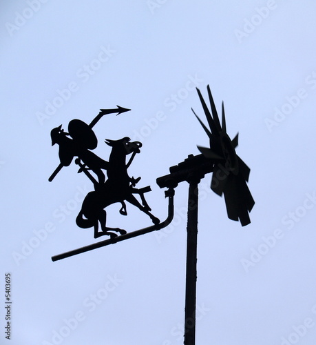 Windrad mit Don Quichotte – Kampf gegen Windmühle