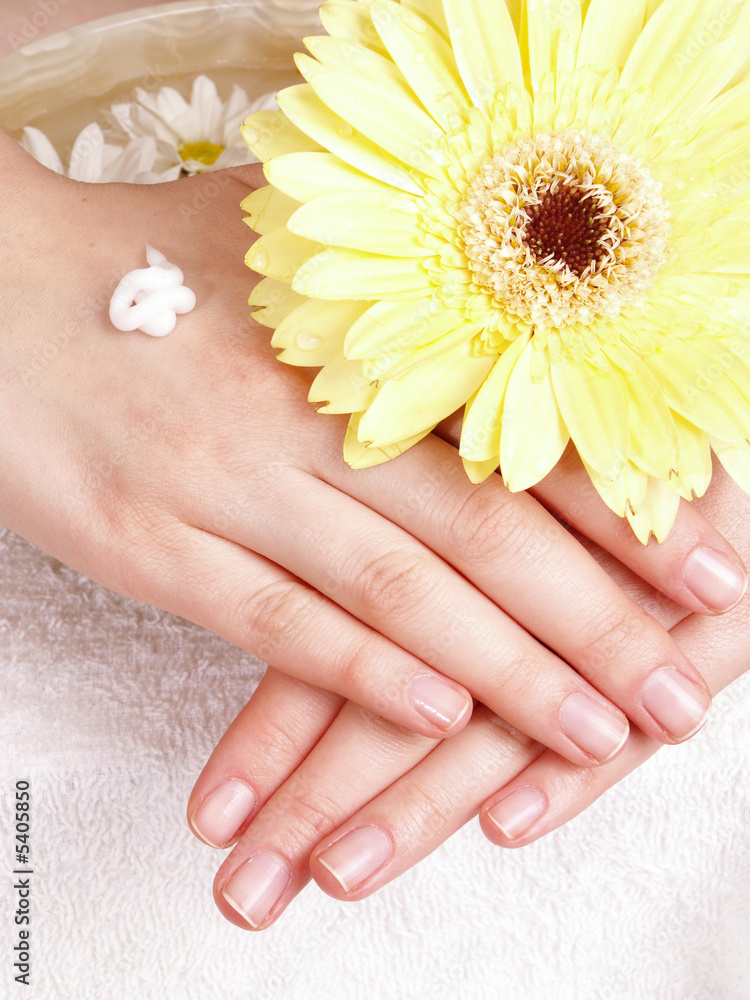 female applying cream to her hands