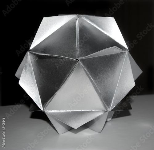 Icosahedron model - paper + alumunium tint (dye). Macro photo