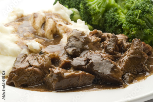 Fotografija angus beef pot roast with gravy mashed potatoes and broccoli