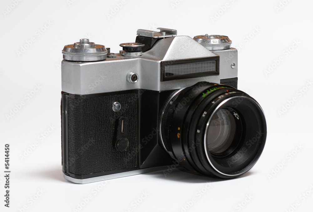 Old soviet 35 mm film camera isolated on white