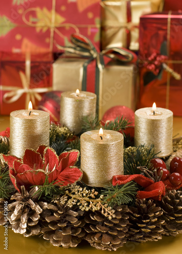 advent wreath with golden candles close up shoot
