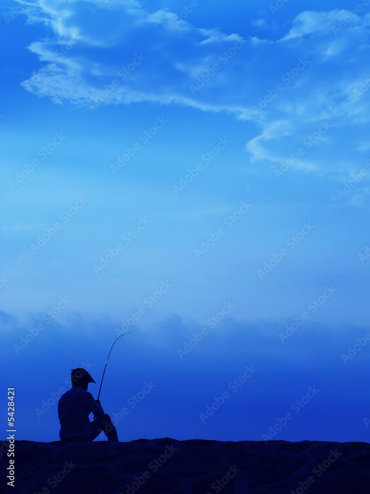 Fishing at dawn at the East Coast Park, Singapore
