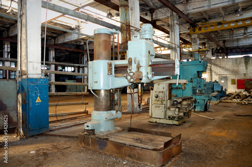 The old metalcutting machine tool at the deserted factory.