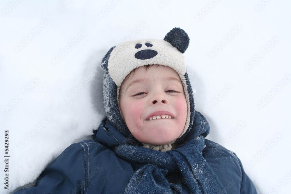 The sight of the nice boy which lays in a snow The sight of the nice boy which lays in a snow