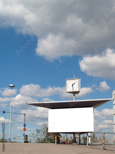 Empty information board and a clock, includes clipping path