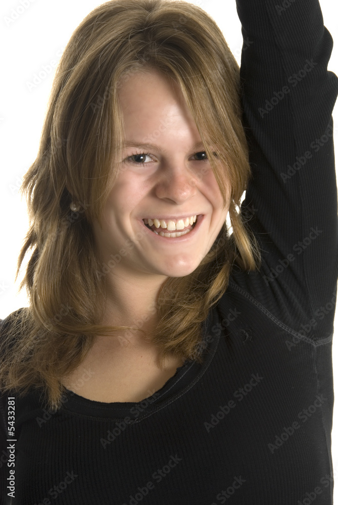 a happy smiling teenage girl against white background a happy smiling teenage girl against white background