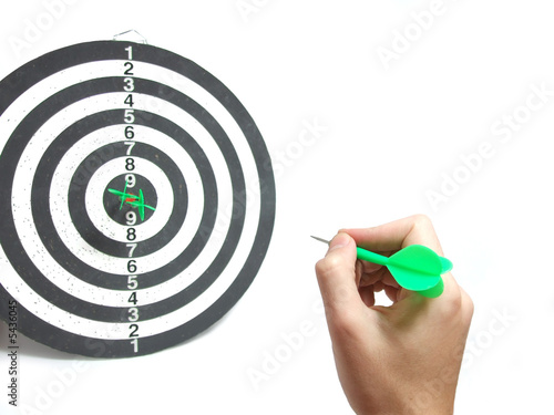 Man playing darts and showing great skill.