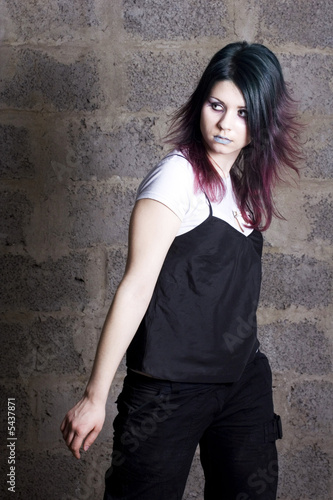 The girl in dark clothes in Gothic style a make-up