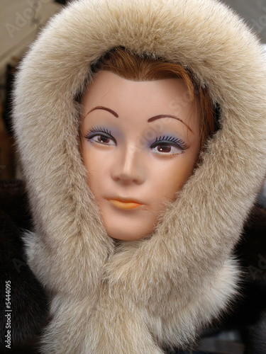 Woman cap from fox fur, close-up