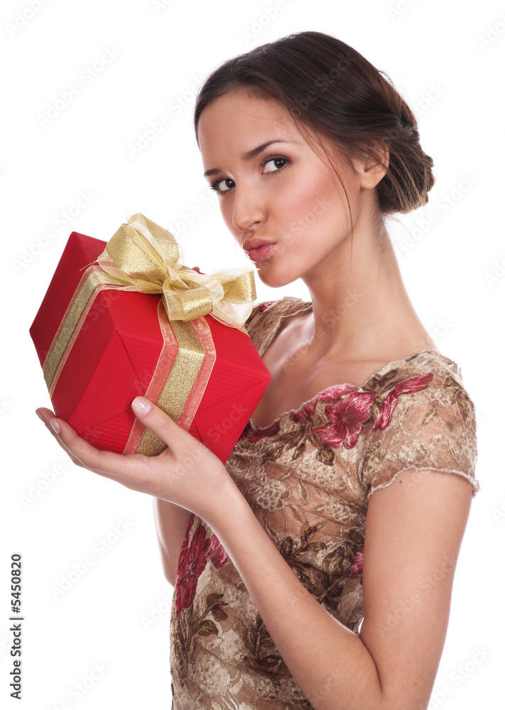 The beautiful girl receives a gift