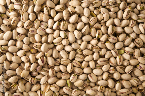 Textured background of pistachio nuts