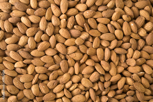 Textured background of shelled almonds