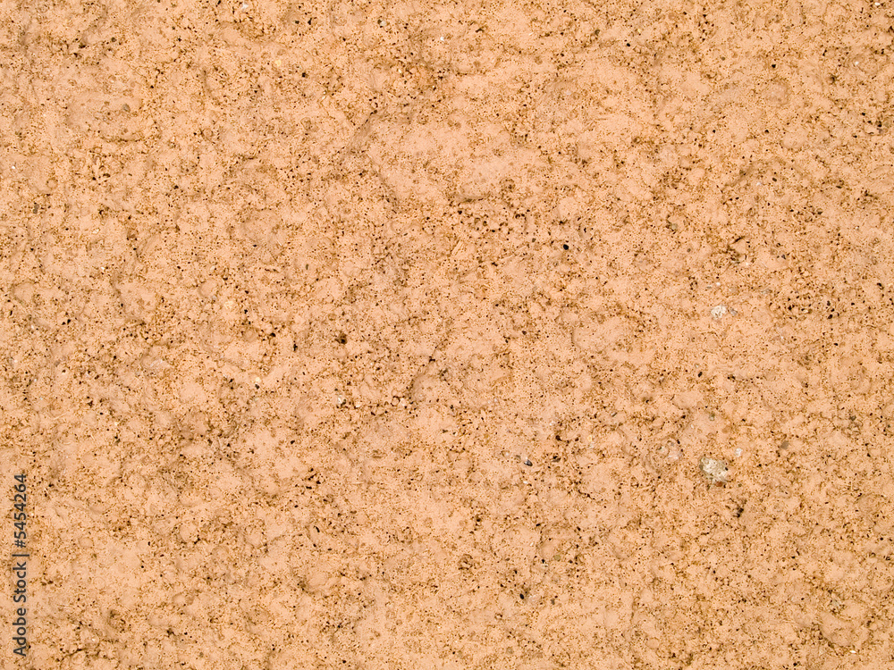 texture of a tan painted cinderblock