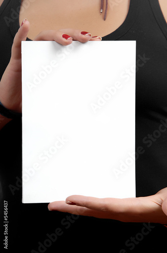 woman hands holding an empty card in the chest