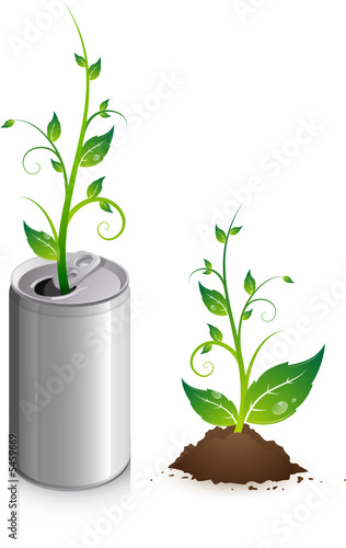 Canette de soda avec jeune plante qui pousse