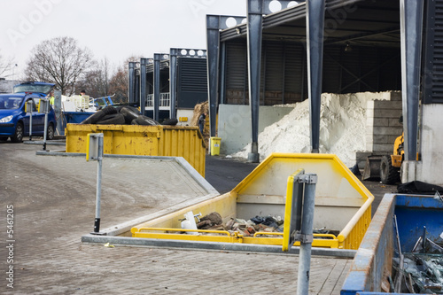 Containers with separated waste bricks and glass to recycle