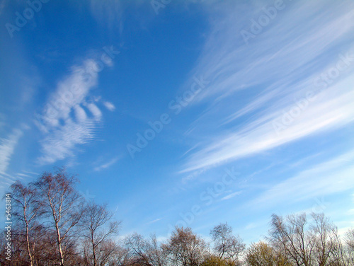 Blue sky partially covered by clouds