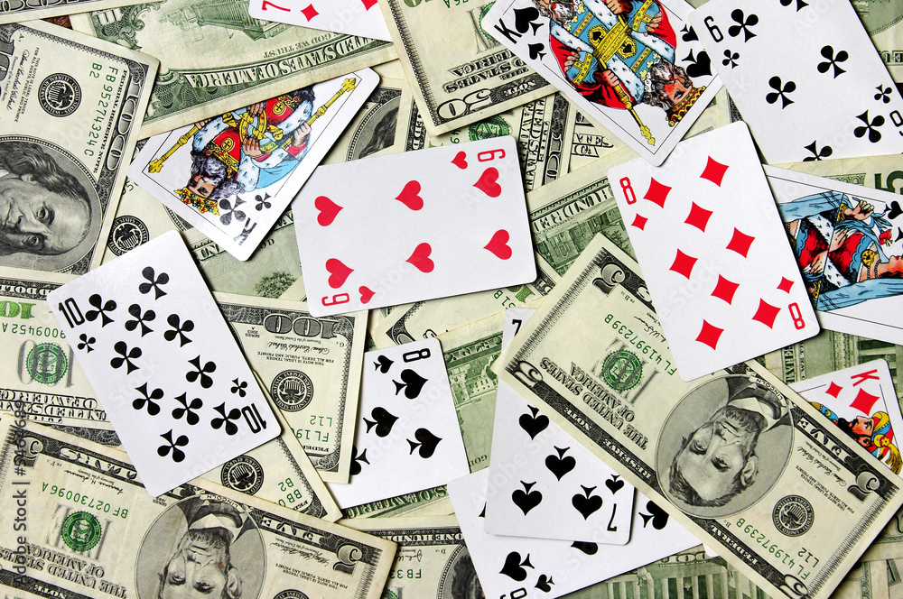 Dollar banknotes and playing cards Dollar banknotes and playing cards