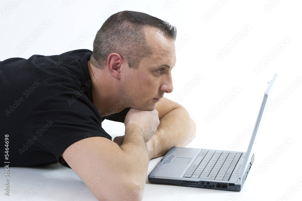 young man with a laptop on white background