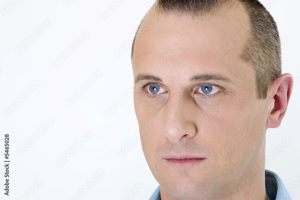 Obraz premium young man with blue eyes on white background