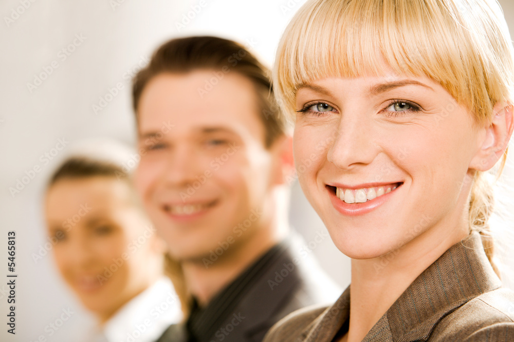 Smiling specialist on the background of human face Smiling specialist on the background of human face