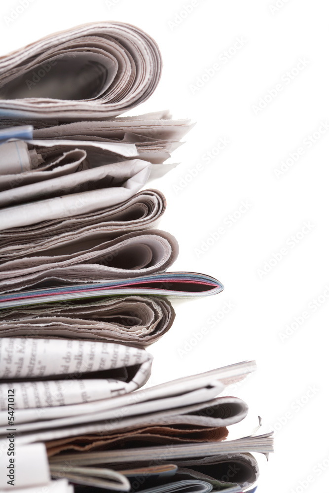 Side view of a stack of newspapers Side view of a stack of newspapers