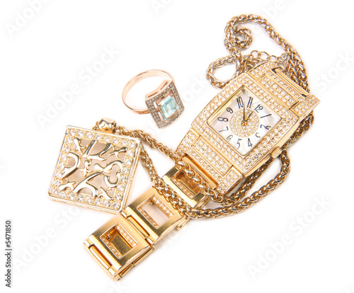 Jewelry set. Gold watch, necklace and ring.