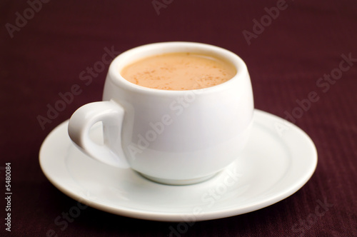 white coffe cup with milk