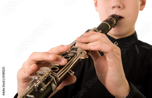 Clarinet player. It is isolated on a white background.