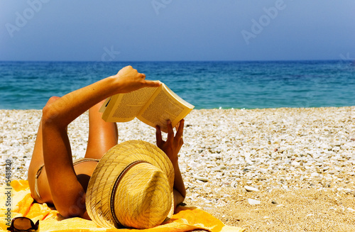 Pretty girl relaxing on holiday at beach