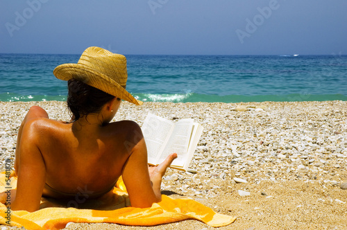 Pretty girl relaxing on holiday at beach