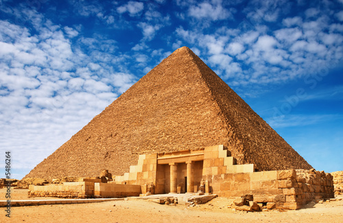 Ancient egyptian pyramid against blue sky #5486264