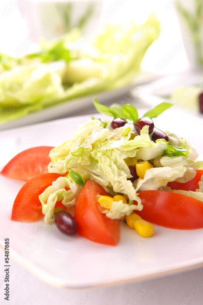 Fresh tomato salad with corn and basil