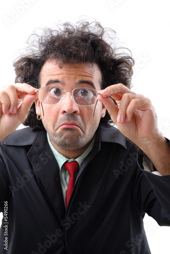 Photo of an adult man holding his glasses . photo