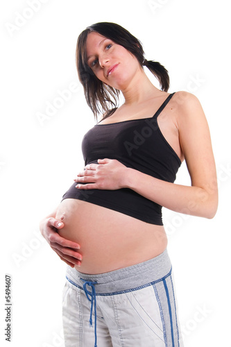 young pregnant woman on white background