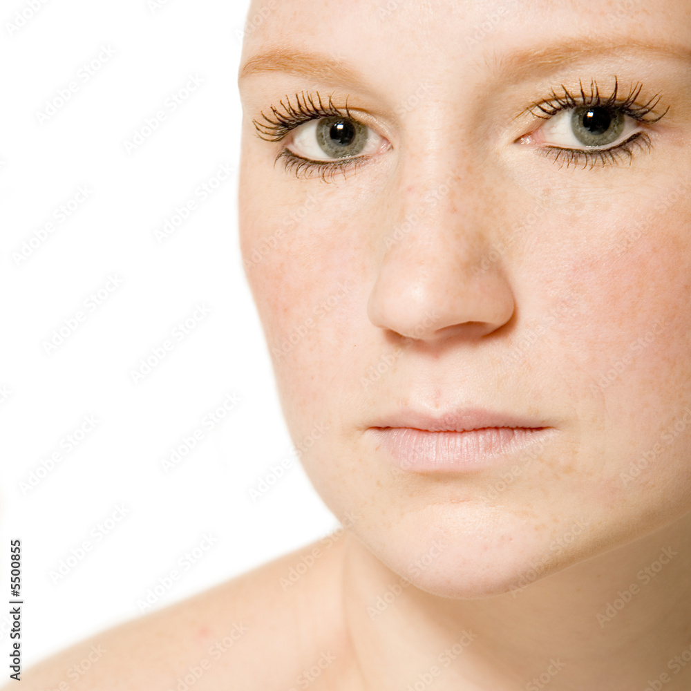 Studio portrait of a thoughtful young woman with short hair Studio portrait of a thoughtful young woman with short hair