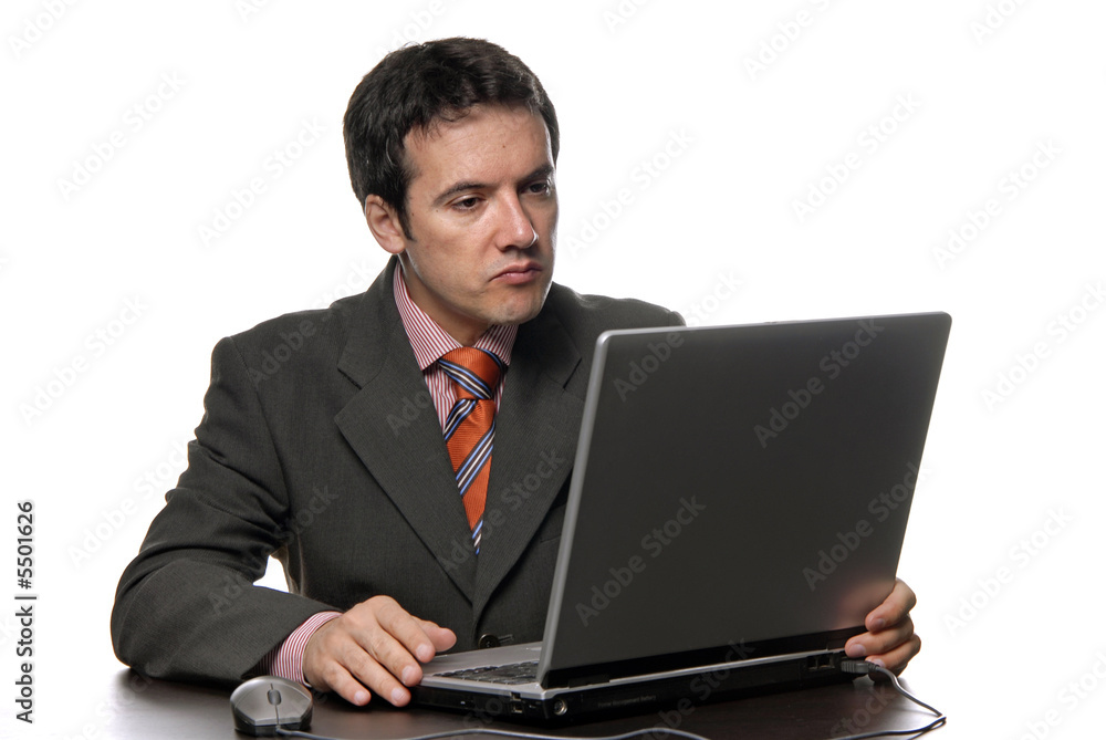 young man and working with is laptop young man and working with is laptop