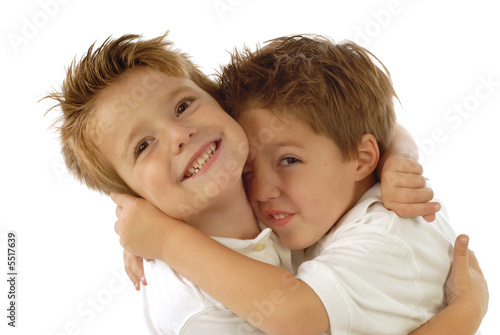 Two young boys playing around and laughing from joy