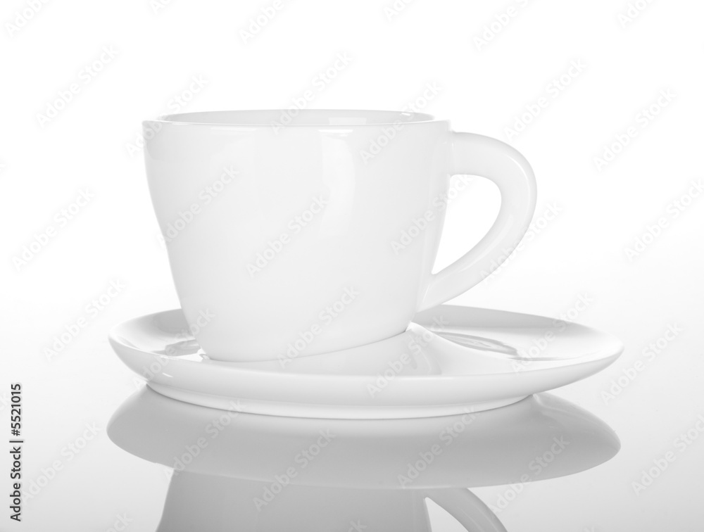 Empty cup of tea on white with reflection Empty cup of tea on white with reflection