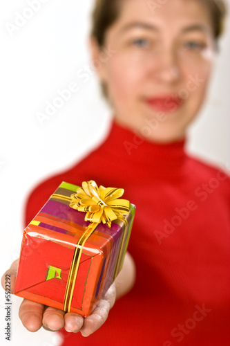 ledy in red with gift, make a present