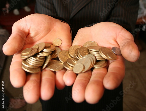 Two palms handful of metall money coins