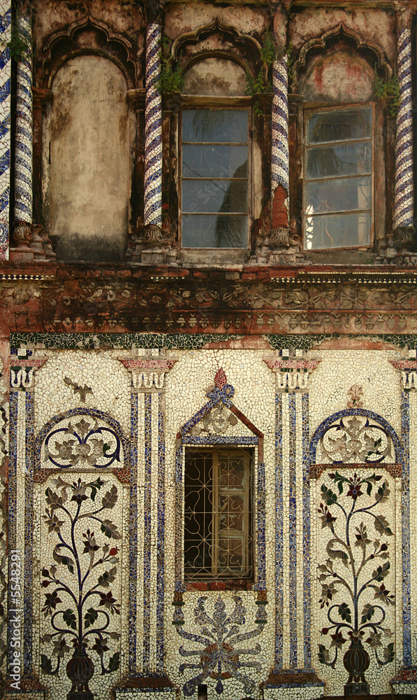mosaic ornaments and windows on the wall in sonargaon