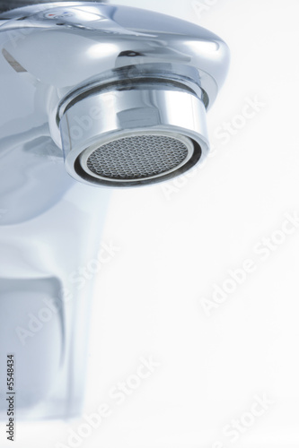 Metallic faucet with sprinkler