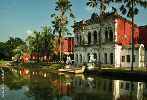Sonargaon museum building with the reflection in the lake